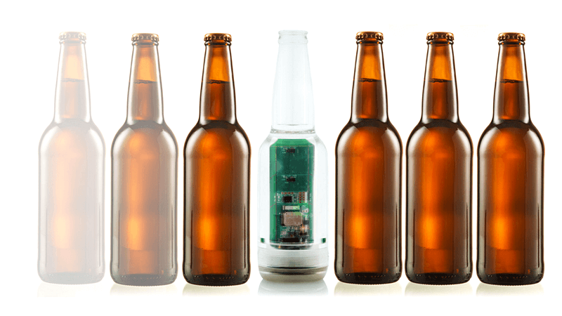 Masitek smartline PressureQC sensor in line with other beer bottles on a white background