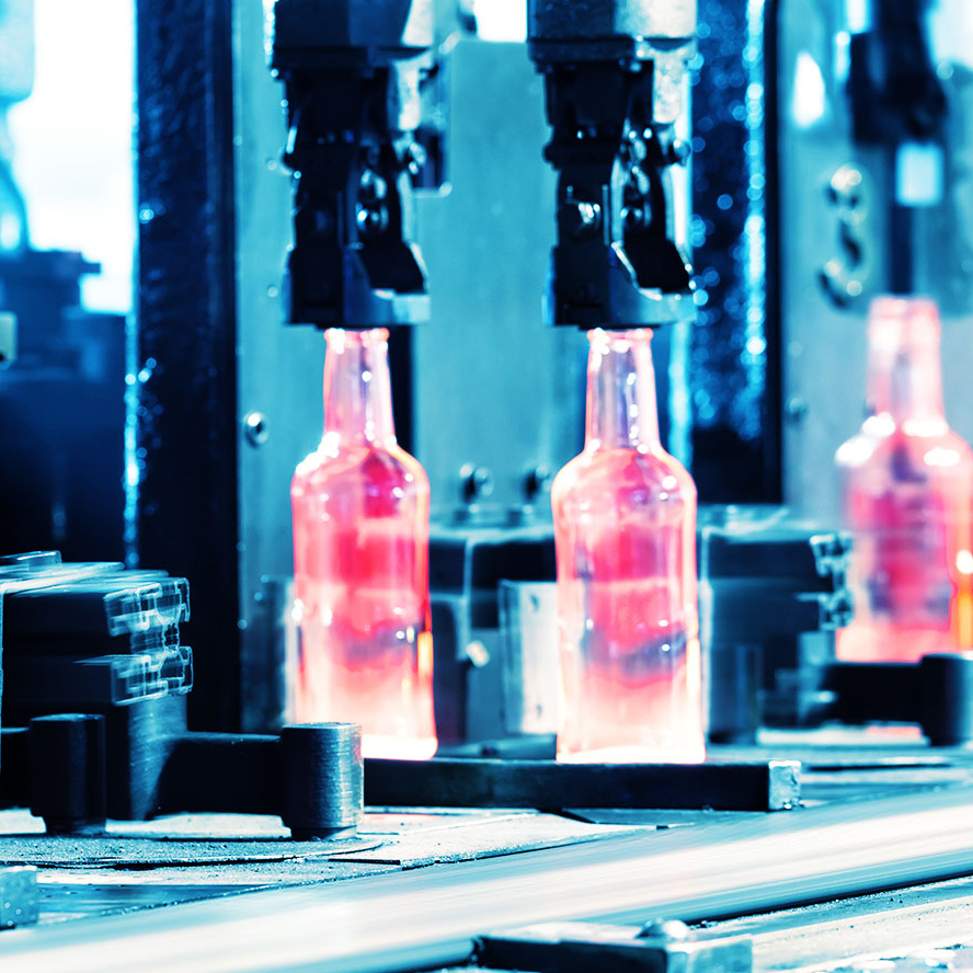 photo of glass bottle during manufacturing